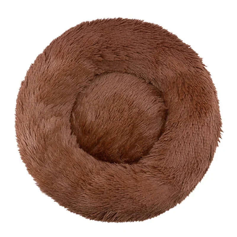 Round plush pet bed in warm brown color, perfect for small to large dogs and cats to sleep comfortably.