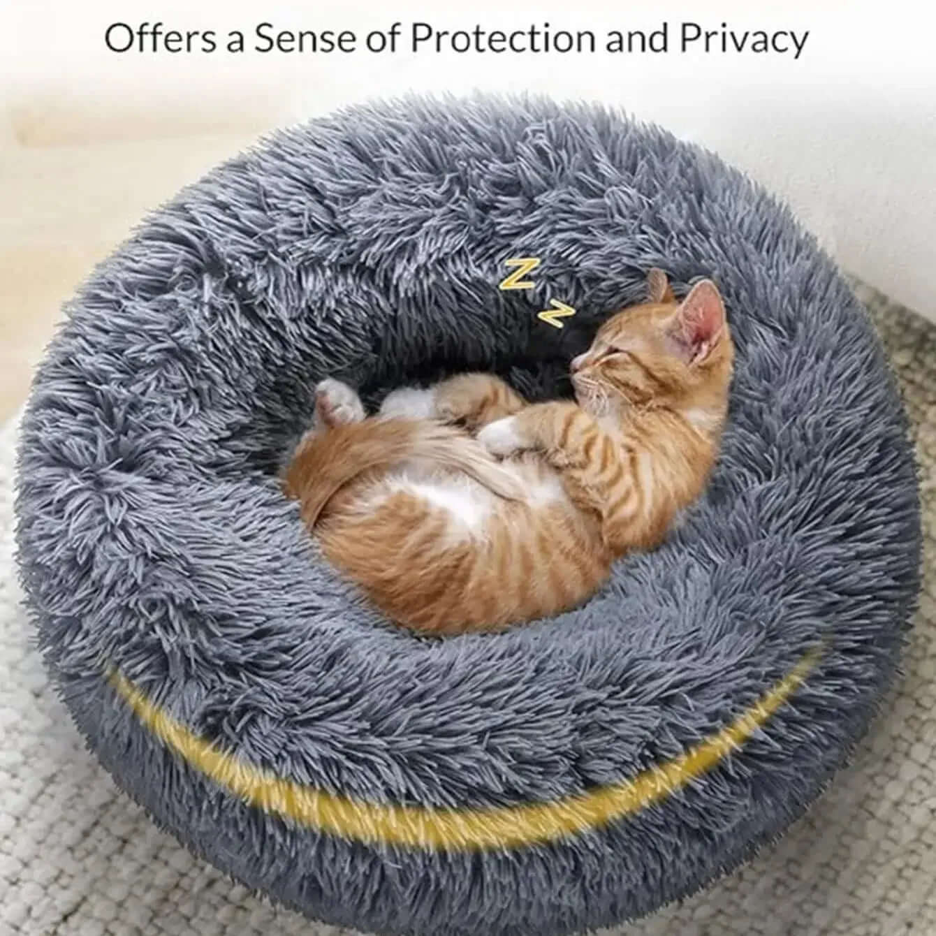 Cozy round pet bed with a fluffy design, featuring a sleeping orange kitten for warmth and comfort.